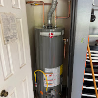 Rheem tank water heater installation in garage